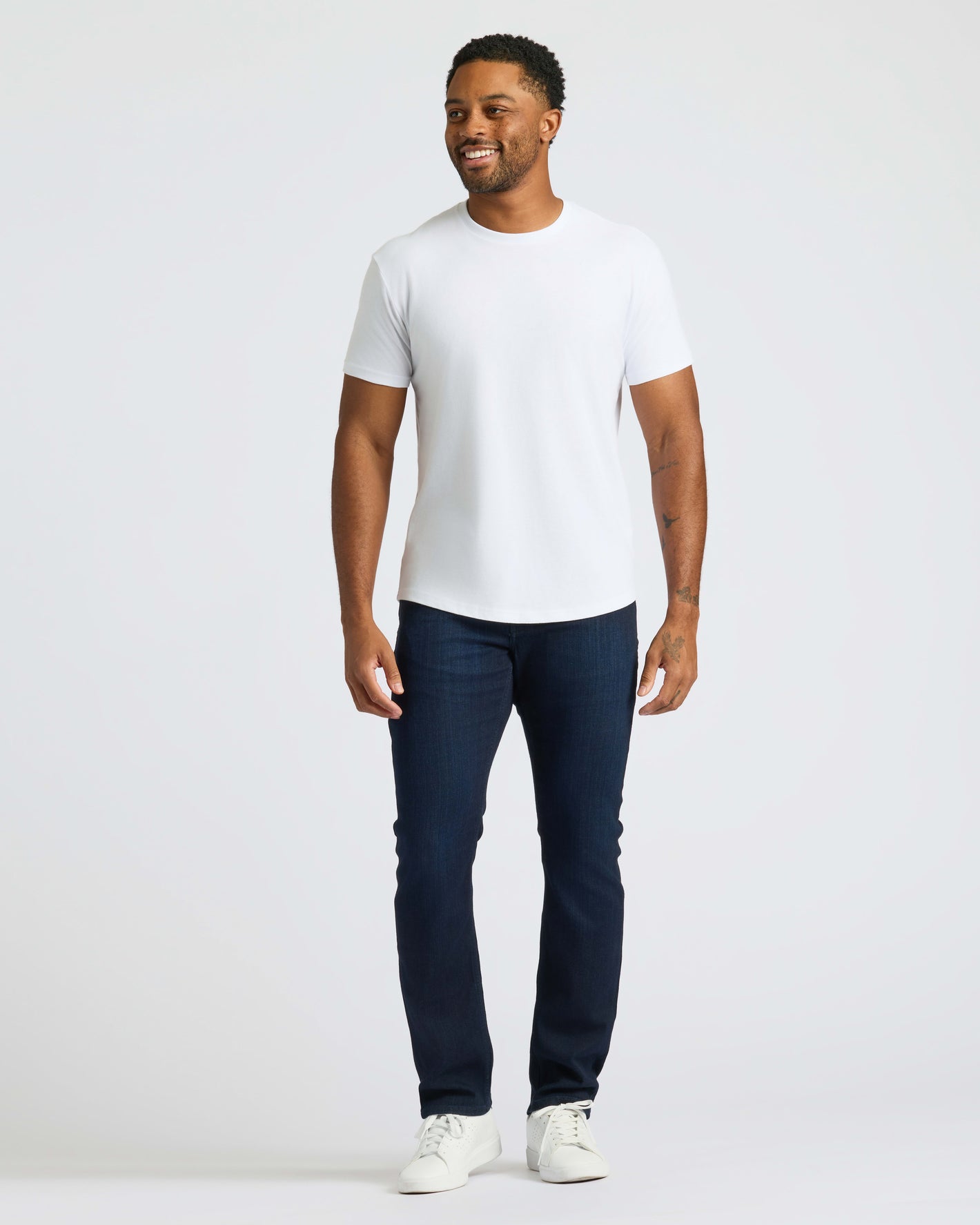 Man wearing Medium Gray Wash Slim Comfort Stretch Jeans.