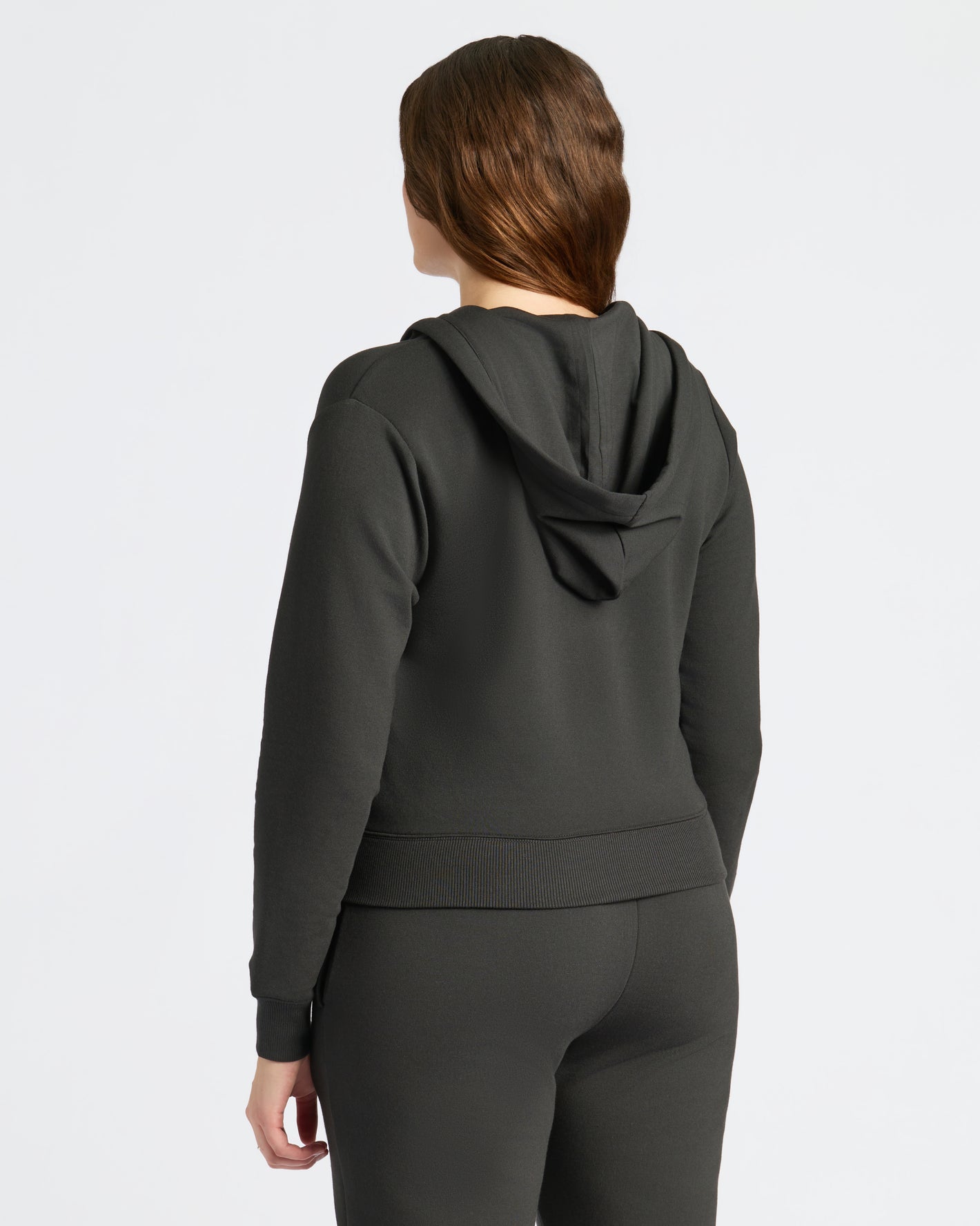 Womens Black Crop Zip Hoodie, relaxed fit, back view.