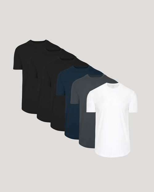 Six short-sleeve crew-neck t-shirts arranged in a diagonal stack on a light gray background, showing color options from black to white.