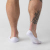 White Never Show Socks 3 Pack on feet with tattoo visible.
