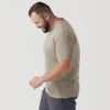 Man wearing Military Beige Short Sleeve Crew Neck Tee, smiling in profile.