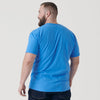 Man in Periwinkle Blue Short Sleeve Crew Neck Tee.