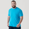 Man wearing Turquoise Short Sleeve Crew Neck Tee, smiling slightly.