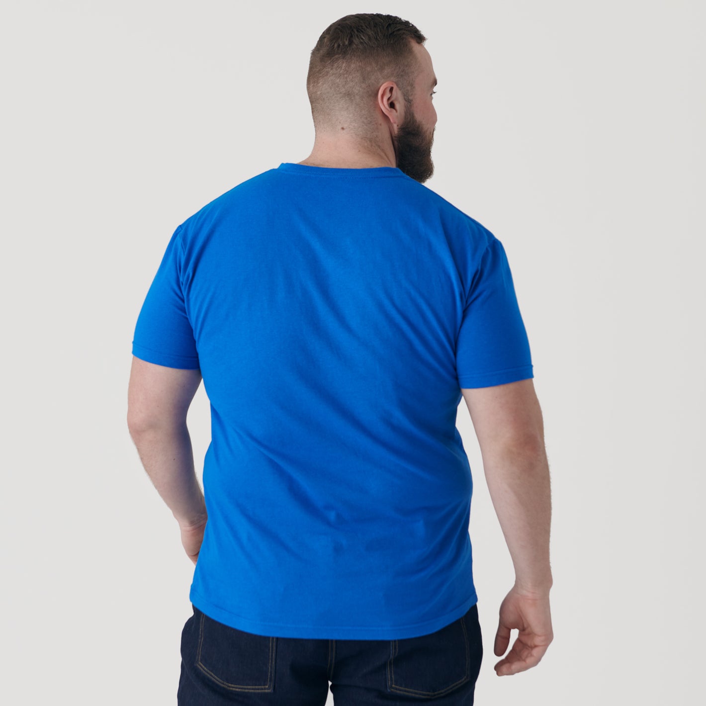 Person wearing Electric Blue V-Neck Tee, viewed from behind.