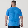 Man wearing Periwinkle Blue V-Neck Tee and dark jeans, back view.