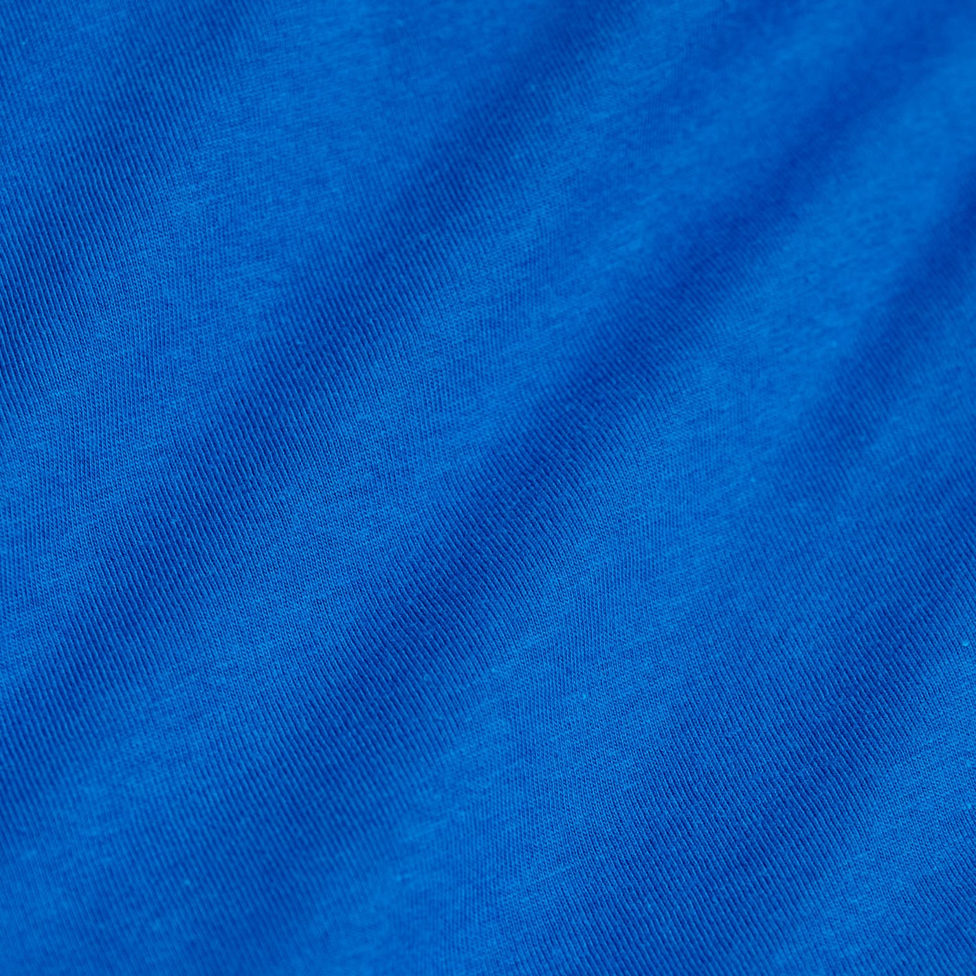 Electric Blue V-Neck Tee close-up of soft woven fabric.