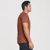 Man wearing Red Rock V-Neck Tee in profile view.