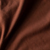 Close-up of Red Rock V-Neck Tee's brown fabric weave.