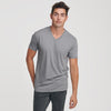 Slate V-Neck Tee worn by man, relaxed pose, neutral backdrop.