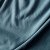 Bluestone Short Sleeve Polo fabric close-up with suede-like texture folds.