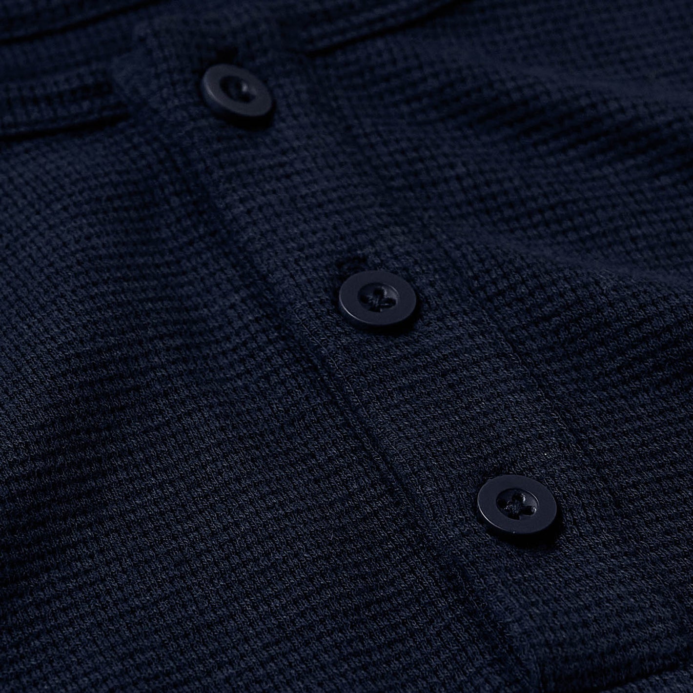 Navy Waffle Long Sleeve Henley with button placket detail.